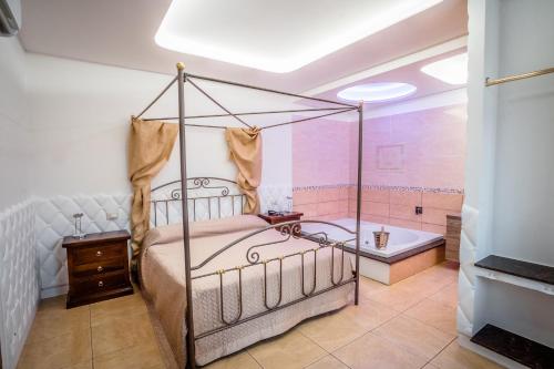 Postel nebo postele na pokoji v ubytování Hotel la Fenice