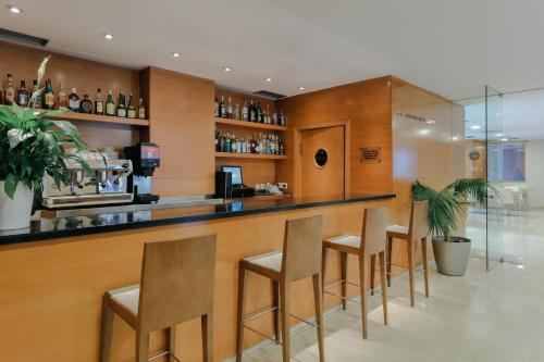 a large kitchen with a large counter top at Hesperia Barcelona Del Mar in Barcelona
