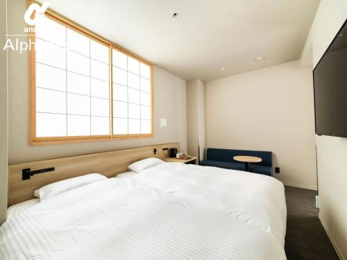 Giường trong phòng chung tại ALPHABED INN Fukuoka Ohori Park / Vacation STAY 65802