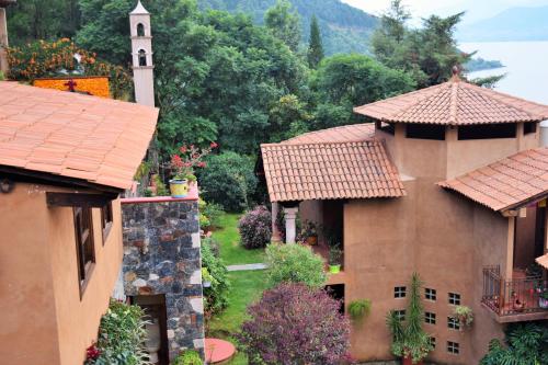 an aerial view of a building with a tower at La Gloria de Los Ángeles in Tzintzuntzán