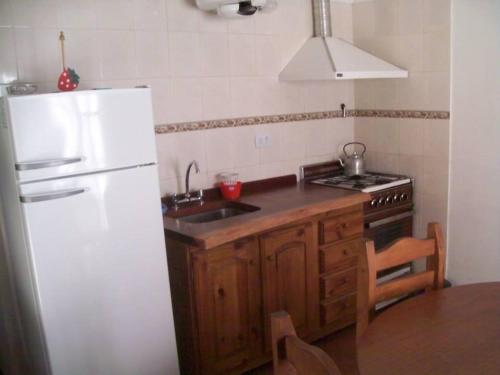 Køkken eller tekøkken på Cabañas Alma Comechingon