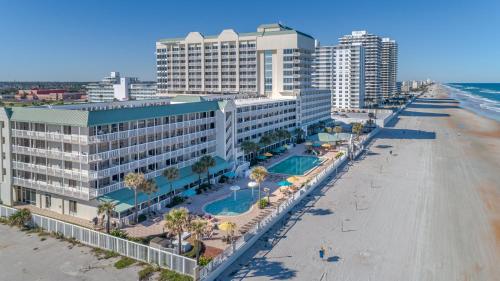 an aerial view of a hotel and the beach at Direct oceanfront, fantastic ocean view, separate bedroom ! - Pools open ! in Daytona Beach
