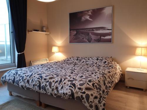 Ένα ή περισσότερα κρεβάτια σε δωμάτιο στο Le 1003