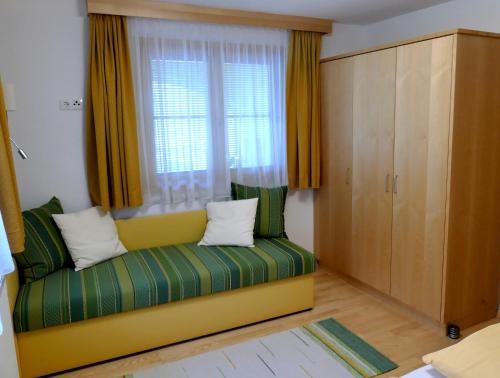 Säng eller sängar i ett rum på Haus Lundegg
