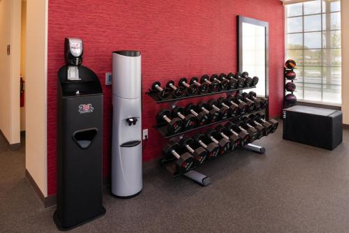a fitness room with a rack of dumbbells at Home2 Suites By Hilton Columbus/West, OH in Columbus