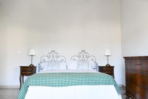 A bed or beds in a room at B&B Porta Romana-Language And Art