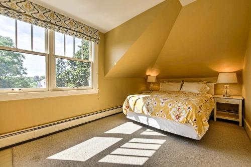 a bedroom with a bed and a large window at Southwest Harbor Home-3 Min to Acadia Natl Park in Southwest Harbor