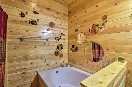 A bathroom at Cozy Heber Springs Cabin with Deck and Dock!