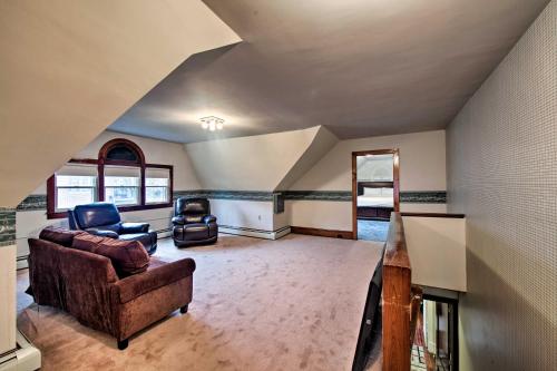 a living room with a couch and a chair at 2 Mi to Reading Pagoda Spacious Home with Deck! in Reading