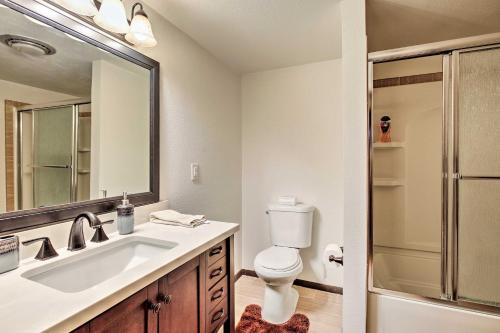 a bathroom with a sink and a toilet and a shower at Lakefront Fairbanks Unit, 1 Mile to Pioneer Park! in Fairbanks