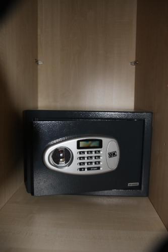 a microwave oven sitting on top of a shelf at Zagglhaus in Scheffau am Wilden Kaiser
