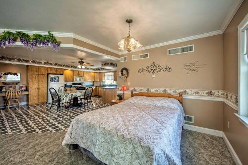 a bedroom with a bed and a dining room at Scenic New Holland Hideaway 13 Mi to Lancaster! in New Holland