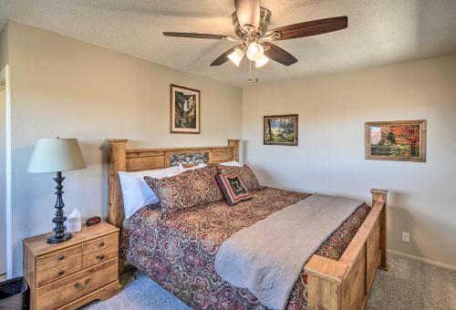 a bedroom with a bed and a ceiling fan at Charming Texas Home with Stunning Canyon Views! in Canyon