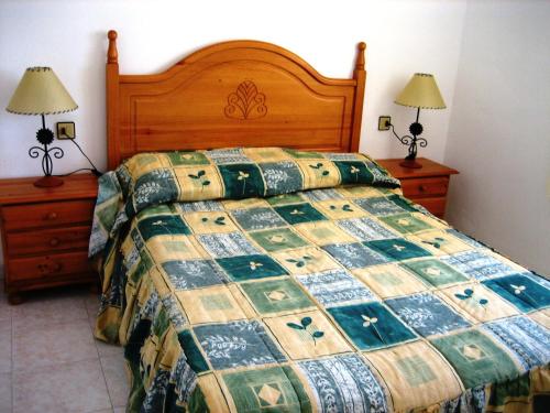 Un pat sau paturi într-o cameră la Can Torrents