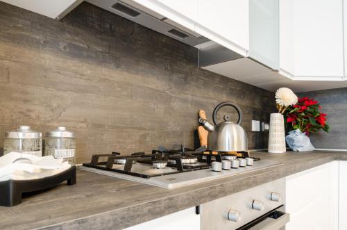 Η κουζίνα ή μικρή κουζίνα στο Fco Secrets Luxury Apartment