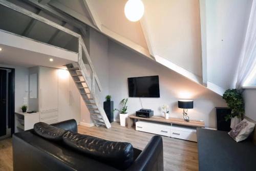 Μια τηλεόραση ή/και κέντρο ψυχαγωγίας στο Apartamenty ZACISZE