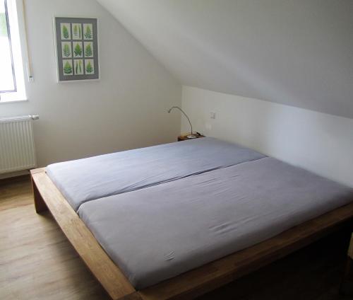 מיטה או מיטות בחדר ב-Schneekäppchen 2