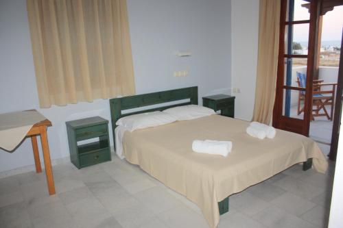 Ένα ή περισσότερα κρεβάτια σε δωμάτιο στο Bluefox Apartments