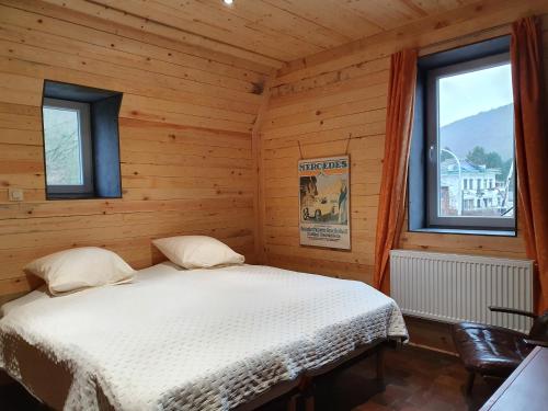 Postel nebo postele na pokoji v ubytování Vue sur Meuse