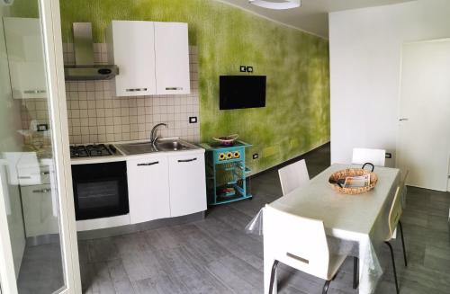 Kuchyň nebo kuchyňský kout v ubytování Sun Home