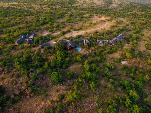 an aerial view of a house on a hill at Nedile Lodge in Welgevonden Game Reserve