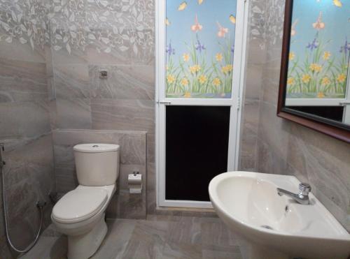 A bathroom at Ging View Villa