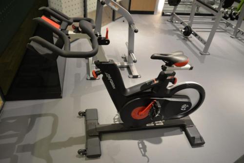 a gym with two exercise bikes on the floor at Executives Hotel - Olaya in Riyadh