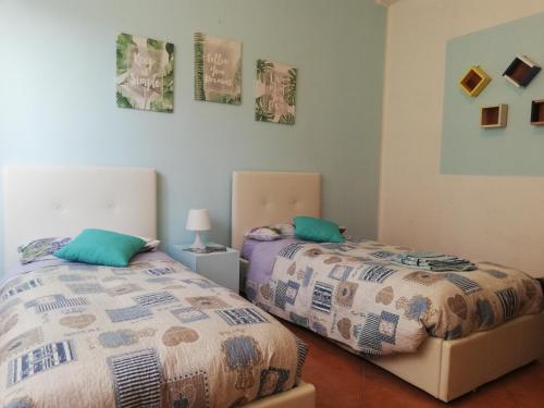 Postel nebo postele na pokoji v ubytování Como Ricky Apartment