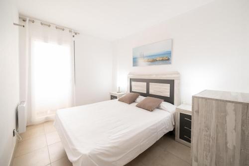 Postel nebo postele na pokoji v ubytování Apartment Meritxell