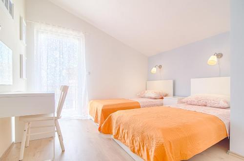 Postel nebo postele na pokoji v ubytování Jasna House