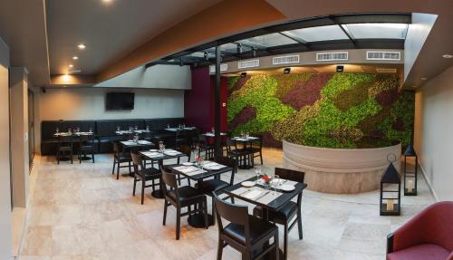 Restaurant o un lloc per menjar a ARC Recoleta Boutique Hotel & Spa