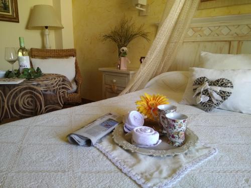 Ein Bett oder Betten in einem Zimmer der Unterkunft Laurel de la Reina Bed & Breakfast - Boutique