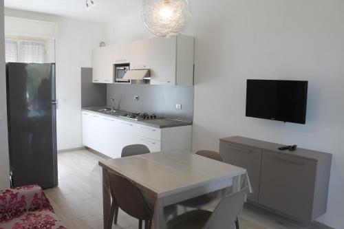 Kuchyň nebo kuchyňský kout v ubytování Le tre Caravelle -La Nina- 50m dal mare - WI-FI