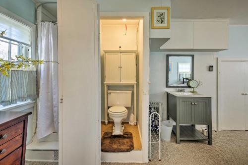 a bathroom with a toilet and a sink at Charming Tivoli Home with Patio, by Town and Shops in Tivoli