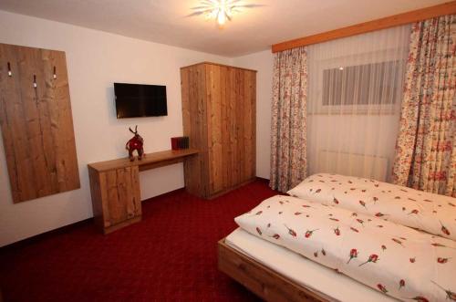 Una cama o camas en una habitación de Haus Lydia