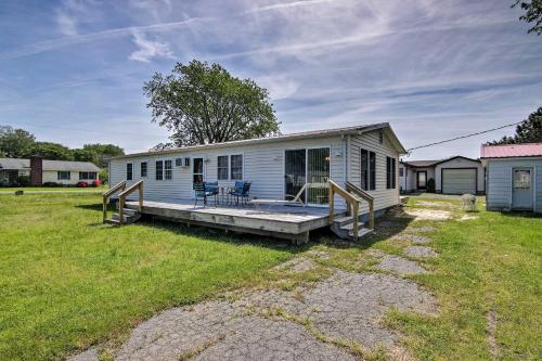 a mobile home with a porch and a deck at Charming Painter Home with Chesapeake Bay Views in Exmore