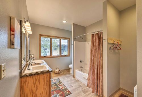 a bathroom with a sink and a shower at Spacious Home 10 Minutes to Ten Sleep Canyon! in Ten Sleep