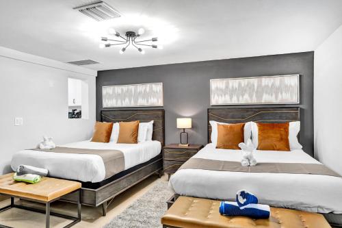 Postel nebo postele na pokoji v ubytování Bright Beachside Getaway