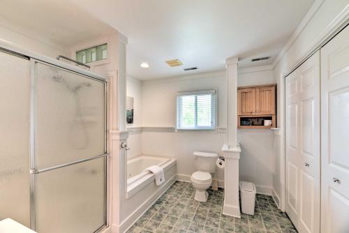 a bathroom with a shower and a toilet at Waterfront Harkers Island Home Sunset View and Dock in Harkers Island