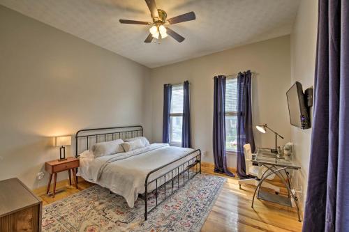 a bedroom with a bed and a ceiling fan at Updated Indianapolis Home, Walk to Lucas Oil! in Indianapolis