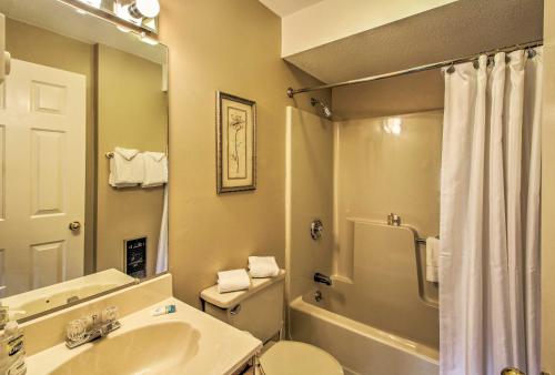 a bathroom with a sink and a toilet and a shower at Lincoln Resort Condo with Pool Access - Near Hiking! in Lincoln