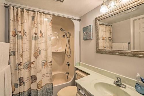 a bathroom with a shower toilet and a sink at Community Pool Access Condo in Myrtle Beach in Myrtle Beach