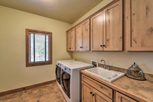 a kitchen with a washing machine and a sink at Pet-Friendly Buena Vista Home with Mtn Views! in Buena Vista
