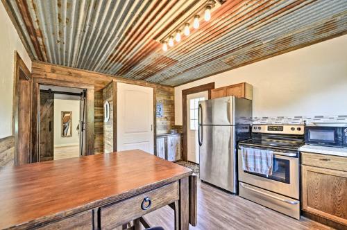 a kitchen with a stainless steel refrigerator and stove at Day Trip to Waco and Temple House on Cattle Farm in Lorena