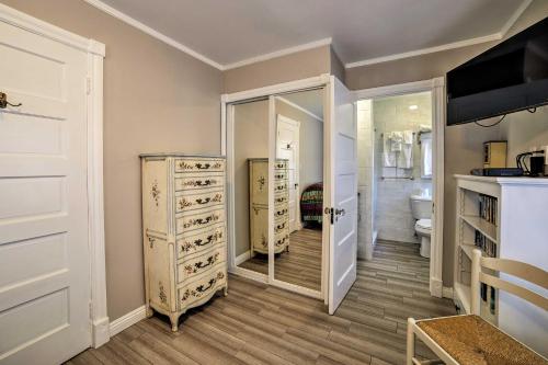 a bathroom with a closet with a mirror and a toilet at Ocean-View Home - Walk to Avalon City Center! in Avalon