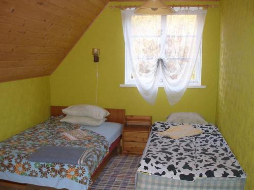 Voodi või voodid majutusasutuse Andrese Holiday Home toas