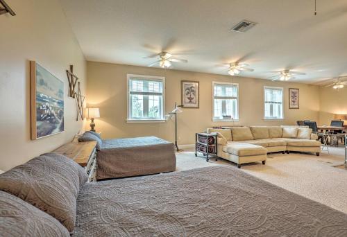 a living room with two beds and a couch at Studio Short Walk to Marina and DT St Augustine in St. Augustine