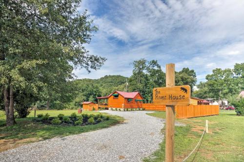 Charming Riverfront Cabin with Private Deck and Hot Tub