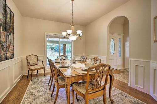 a dining room with a table and chairs at McMinnville Wine Country Home with Hot Tub and Deck in McMinnville