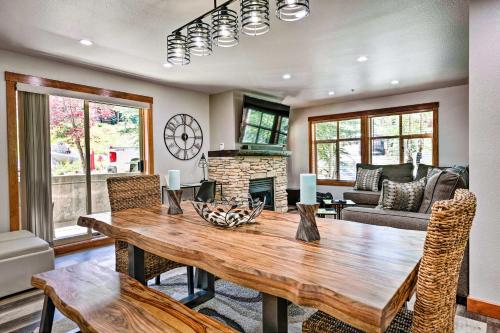 a dining room with a table and a fireplace at Solitude Mountain Resort Condo at Lift Base! in Solitude